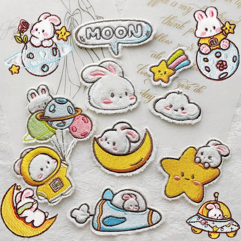 cute space bunny embroidered stick-on patches complete set of 12 all designs white fluffy bunny space theme raised velvety embroidery