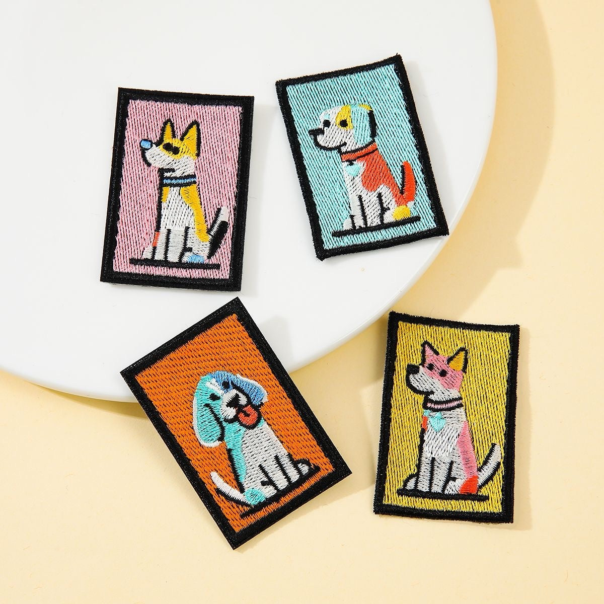 pointy ear akita patchwork hound mottled puppy and pink silhouette dog retro pop art stick-on embroidered patches on table