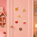 fluffy chenille smiling waffle with cherry triangle pizza french fries with arms popcorn bucket and chocolate cookie stick-on patches on a pink door in a girls room