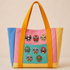eight Peking Opera mask embroidered patches on a pastel color-block canvas tote bag