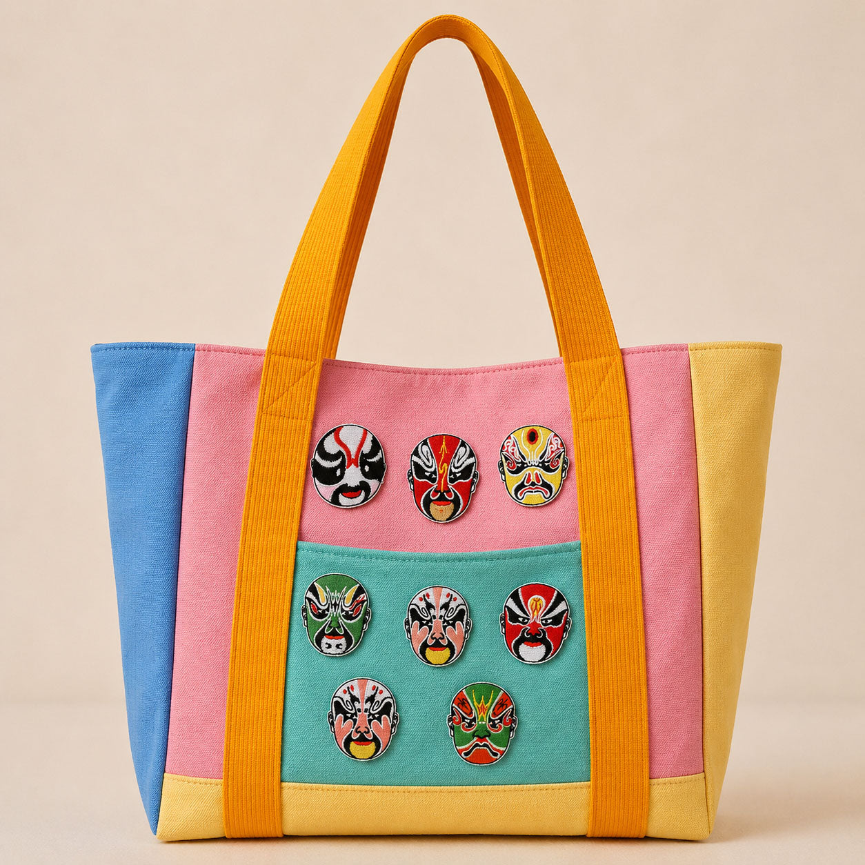 eight Peking Opera mask embroidered patches on a pastel color-block canvas tote bag