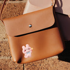 little bunny buddy embroidered patch sticker on a crossbody bag