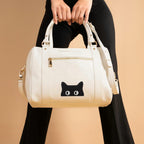 peeking cat embroidered patch on handbag