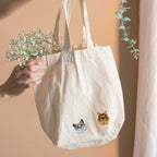 realistic cat breed embroidered patch sticker on a canvas tote bag