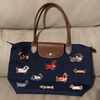 royal crowned dachshund stick-on embroidered patch on shoulder bag