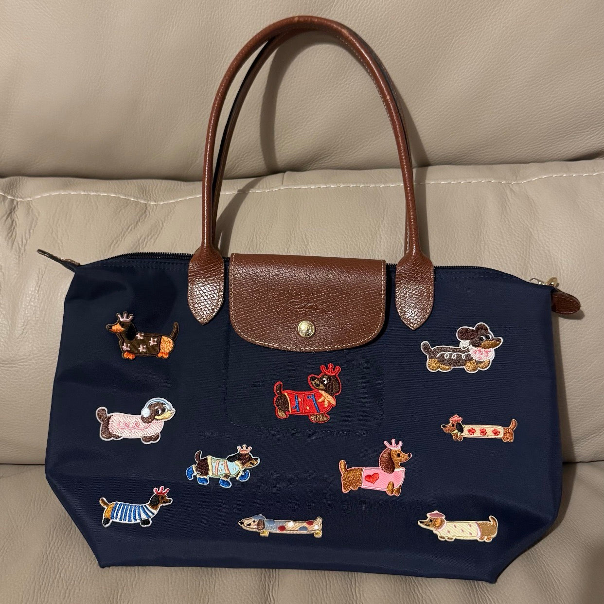 royal crowned dachshund stick-on embroidered patch on shoulder bag