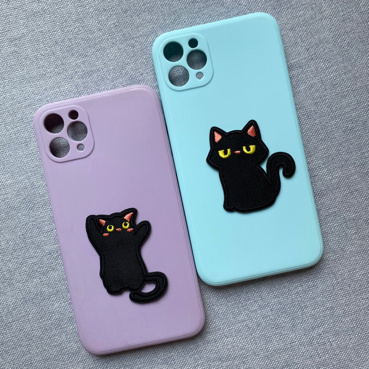 whimsical void cat embroidered patches on phone case