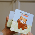 animated close-up of adorable red panda embroidered patch texture and stitching