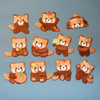 set of 11 adorable red panda embroidered patches flat lay
