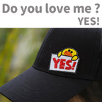yellow duck embroidered patch on a hat