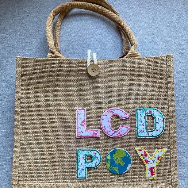 celestial outer space embroidered stick-on patch on jute tote bag