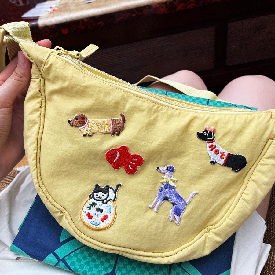 tuxedo cat and goldfish embroidered stick-on patch on crossbody bag