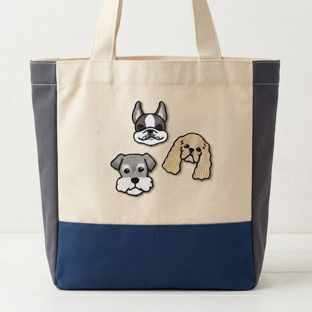 french bulldog schnauzer and cocker spaniel stick-on patches decorating a natural canvas and blue tote bag