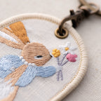 vintage storybook bunny double-sided embroidered keychain charm embroidery detail