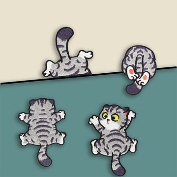 funny climbing grey tabby cat embroidered stick-on patches — four angles of the same cat mid-climb including tail and legs front view cat butt and back view