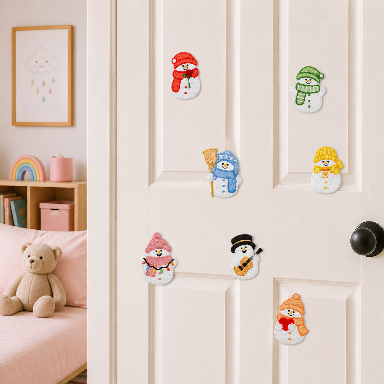 snowman with rose broom guitar string lights and heart in red green blue yellow pink and orange outfits stick-on patches on a white bedroom door