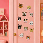 twelve realistic cat breed portrait embroidered patches with persian siamese tabby and tuxedo cats on a pink bedroom door