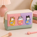 cute cats peeking out of milk pocket stick-on patches decorating a pink and purple color-block leather makeup bag