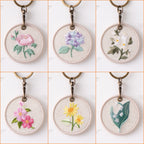 set of six botanical floral double-sided embroidered keychain charms