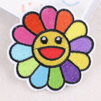 multicolor rainbow smiley flower embroidered patch close-up detail