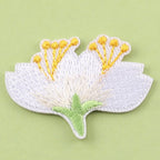 single jasmine bloom elegant floral embroidered patch close-up detail