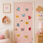 eleven vibrant embroidery butterfly patches in blue yellow red pink and green scattered on a pink bedroom door in a girls room