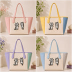 Gray tabby cat embroidered stick-on patches on tote bags in four color combinations
