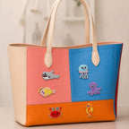 cute sea creatures embroidered stick-on patches on canvas tote bag