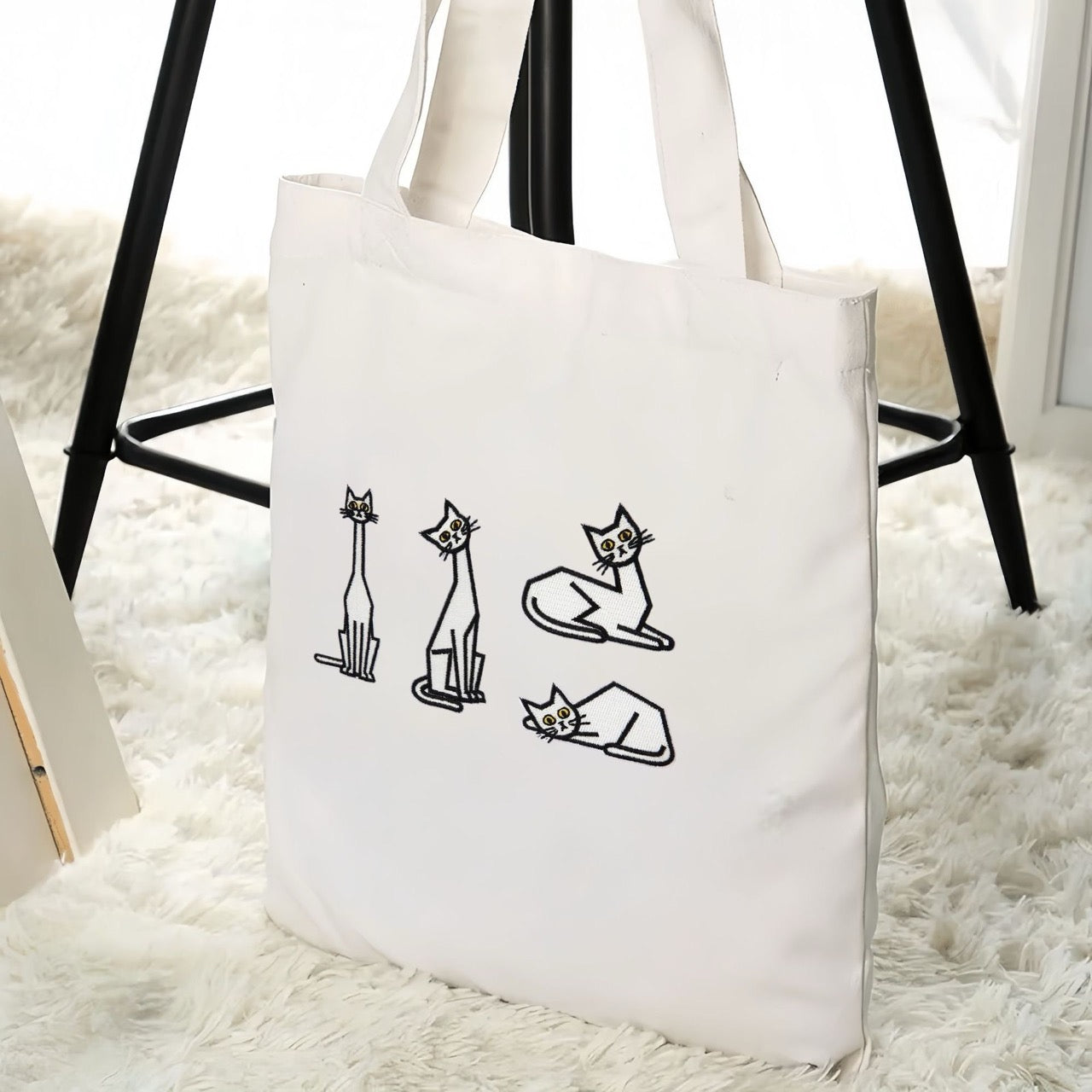 minimalist white cat stick-on embroidered patch on eco tote bag