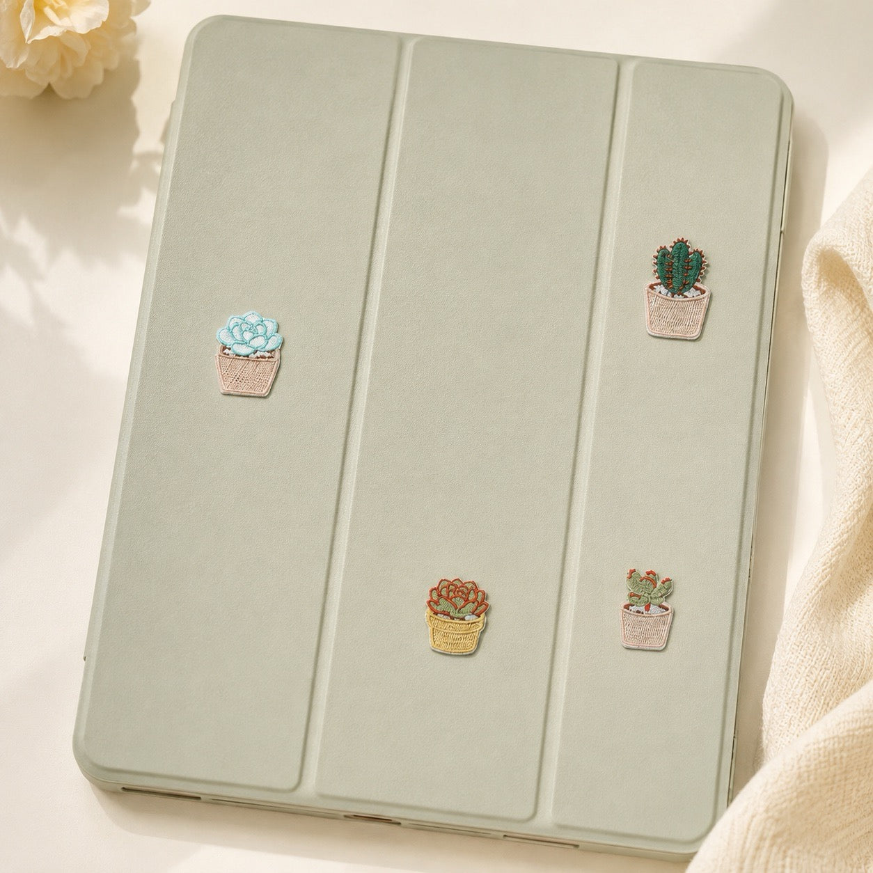 mini potted succulent embroidered stick-on patches on iPad case