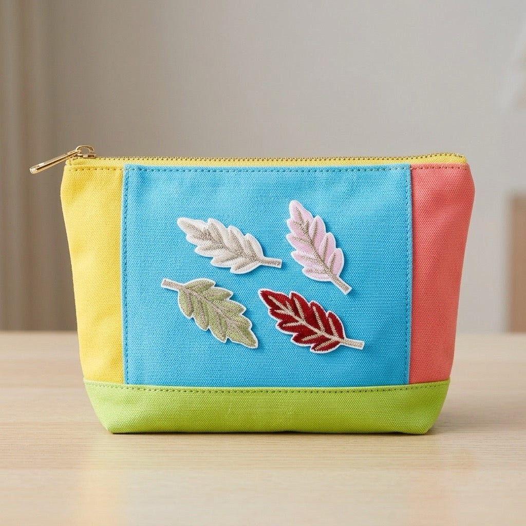 mini leaf embroidered stick-on patch on makeup pouch