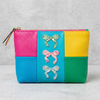vintage ditsy floral bow stick-on embroidered patch on makeup bag
