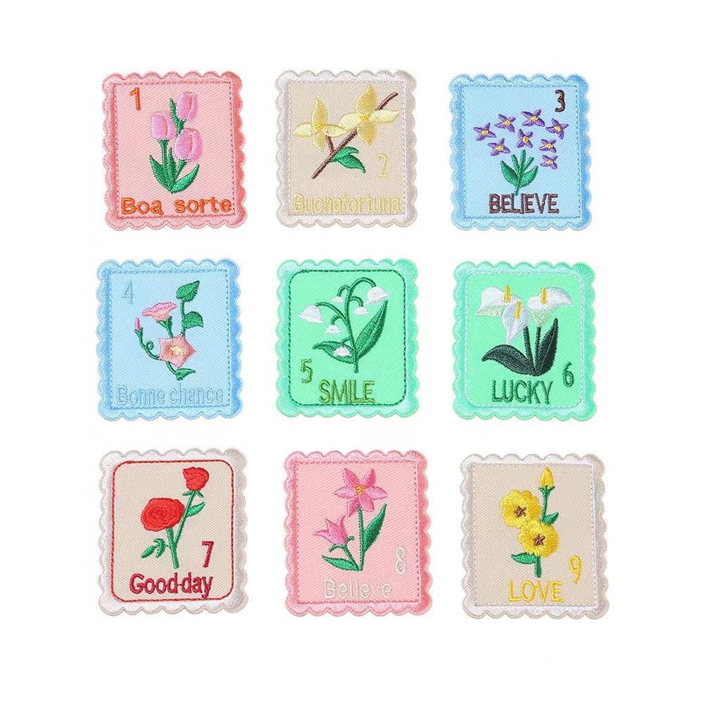 set of nine floral postage stamp embroidered stick-on patches