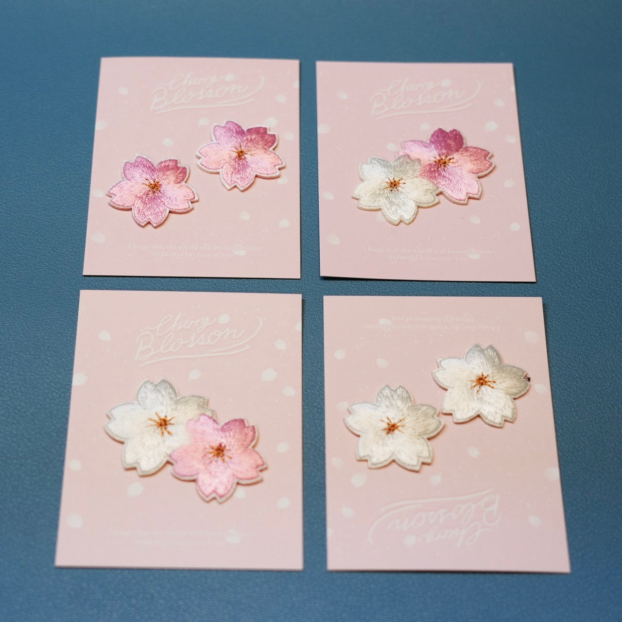 set of 4 blush and white sakura cherry blossom patches with retail packaging