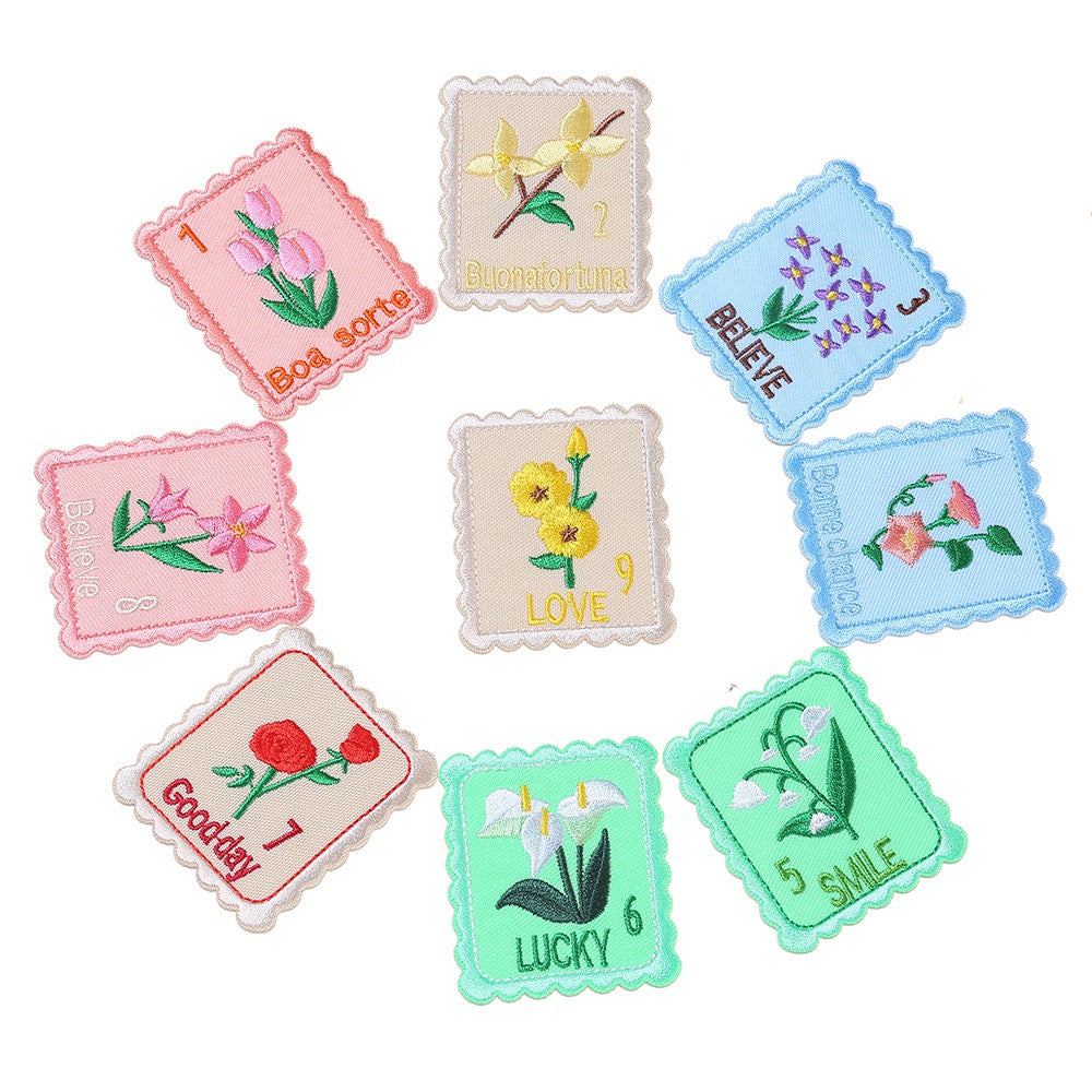floral postage stamp embroidered stick-on patches, nine designs