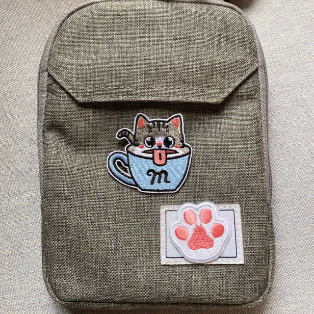 everyday tabby cat embroidered stick-on patch on a small pouch