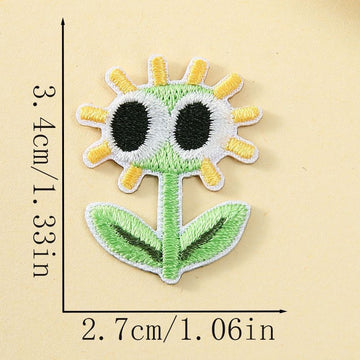 derpy green daisy googly eyes embroidered stick-on patch
