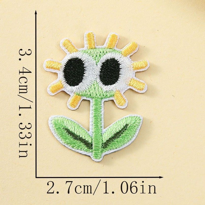 derpy green daisy googly eyes embroidered stick-on patch