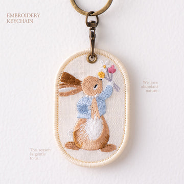 gathering wildflowers storybook bunny double-sided embroidered keychain charm