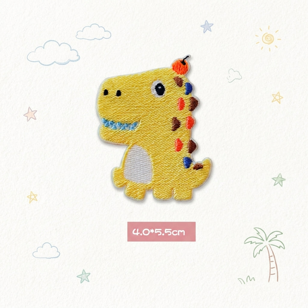 yellow T-Rex kawaii embroidered stick-on patch — round yellow tyrannosaurus with blue teeth orange-red spines white belly standing upright