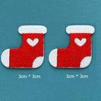 red heart stocking embroidered stick-on patches — pair of red stockings with white cuff white heart motif and white toe 30x30mm
