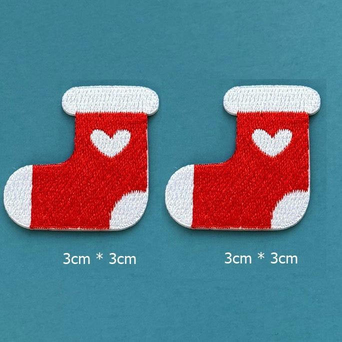 red heart stocking embroidered stick-on patches — pair of red stockings with white cuff white heart motif and white toe 30x30mm