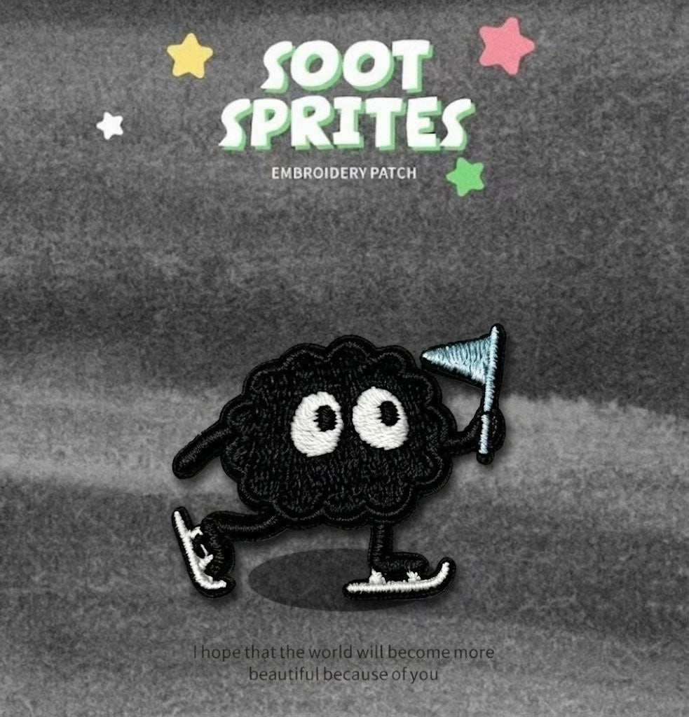 soot sprite ice skating with blue flag embroidered stick-on patch