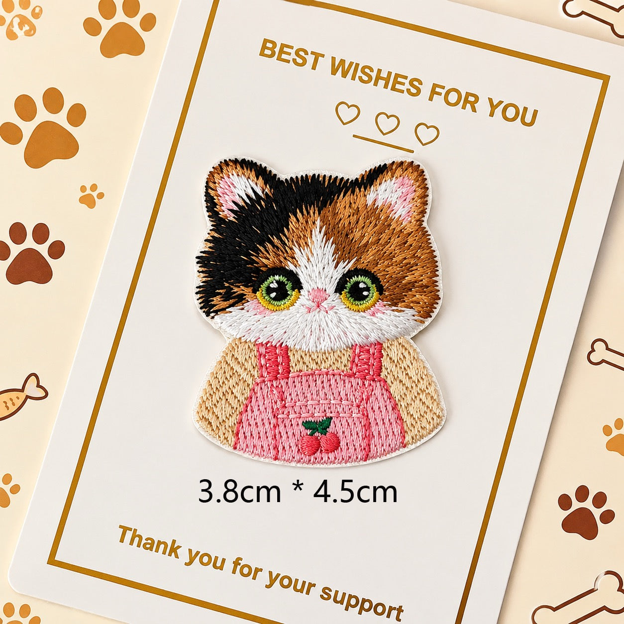 calico cat in cherry overalls embroidered stick-on patch — green yellow eyes red cherry print overalls