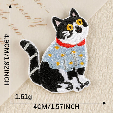 curious tuxedo cat in blue sweater whimsical embroidered stick-on patch