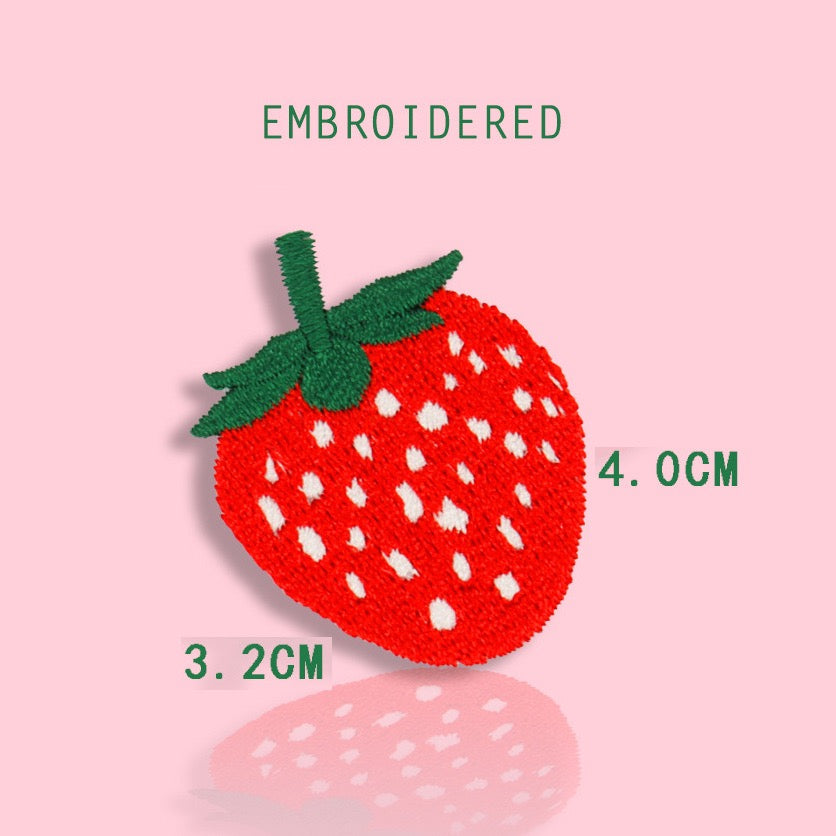 large red strawberry embroidered stick-on patch — vivid red dense embroidery with white seed dots and deep green leaf top 32x40mm