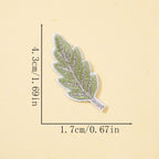 green leaf embroidered stick-on patch with silver metallic vein detail