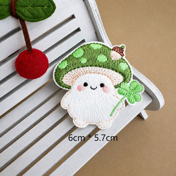 spring clover mushroom baby embroidered stick-on patch — green spotted cap holding clover with white flower
