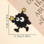 running soot sprite embroidered patch with two yellow stars
