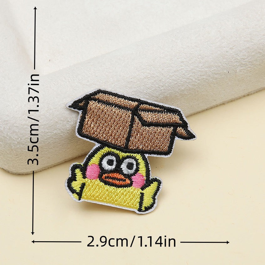 duck hiding under cardboard box funny quirky embroidered stick-on patch